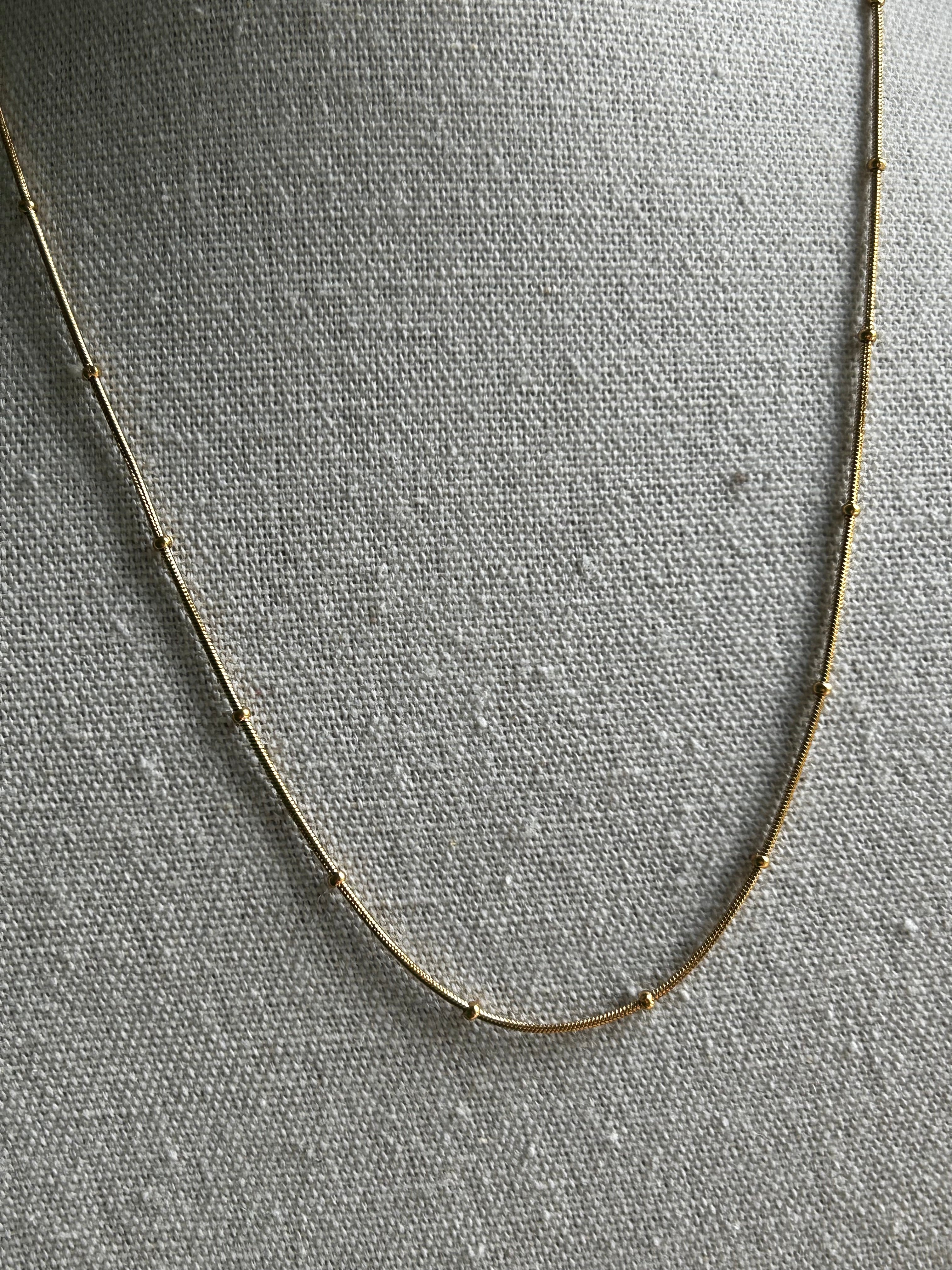 Collier acier inoxydable doré boule simple
