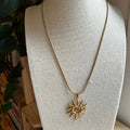 Collier acier inoxydable doré pendentif soleil
