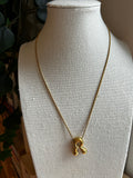 Collier acier inoxydable doré lettre R