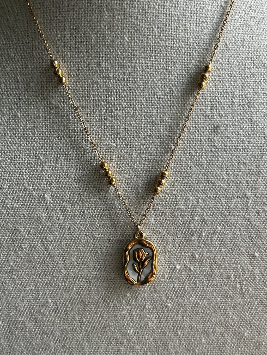Collier acier inoxydable doré fleur