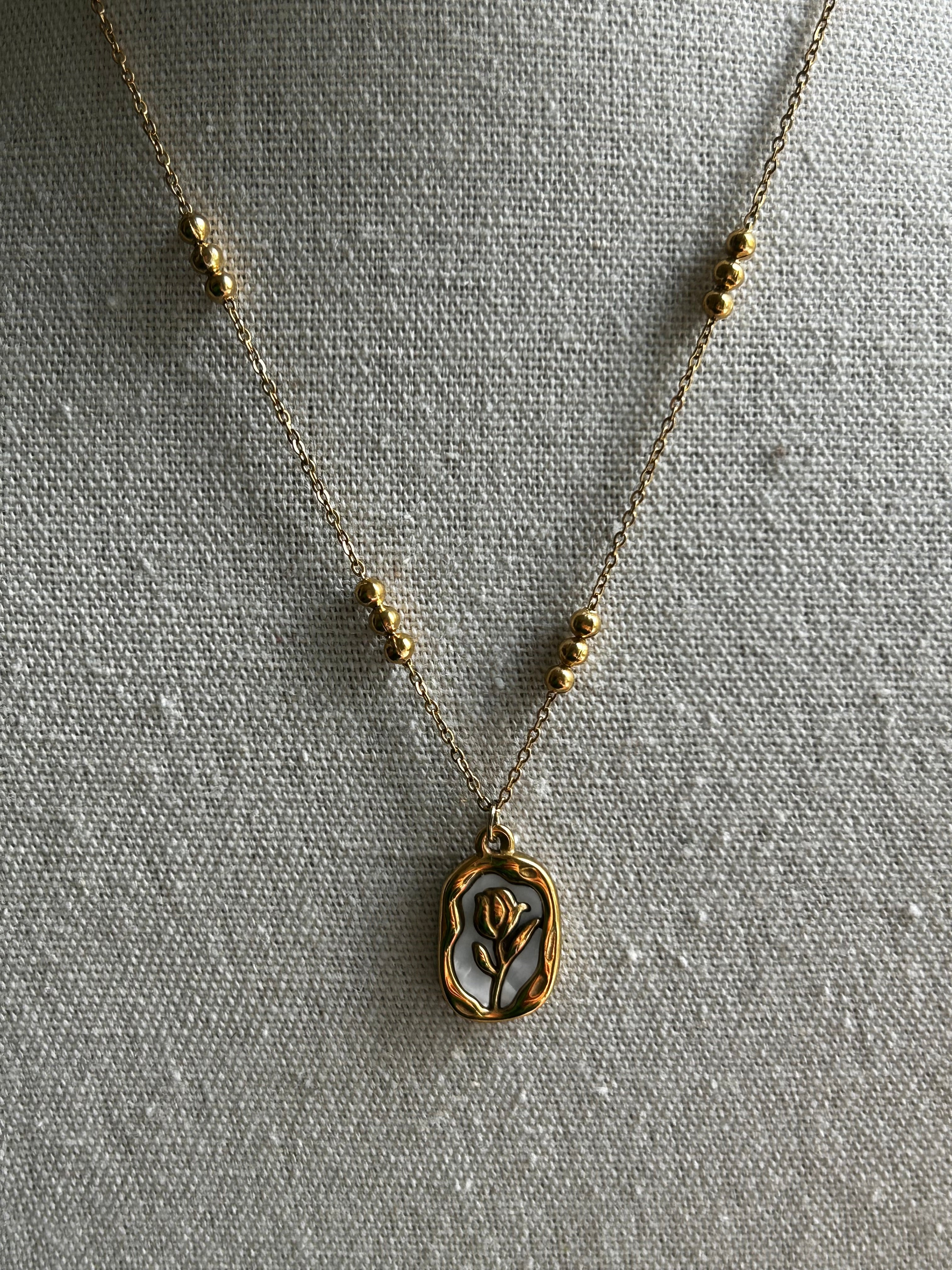 Collier acier inoxydable doré fleur