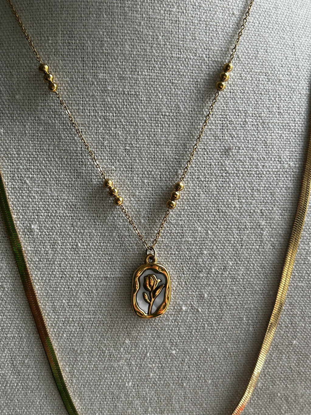 Collier acier inoxydable doré fleur