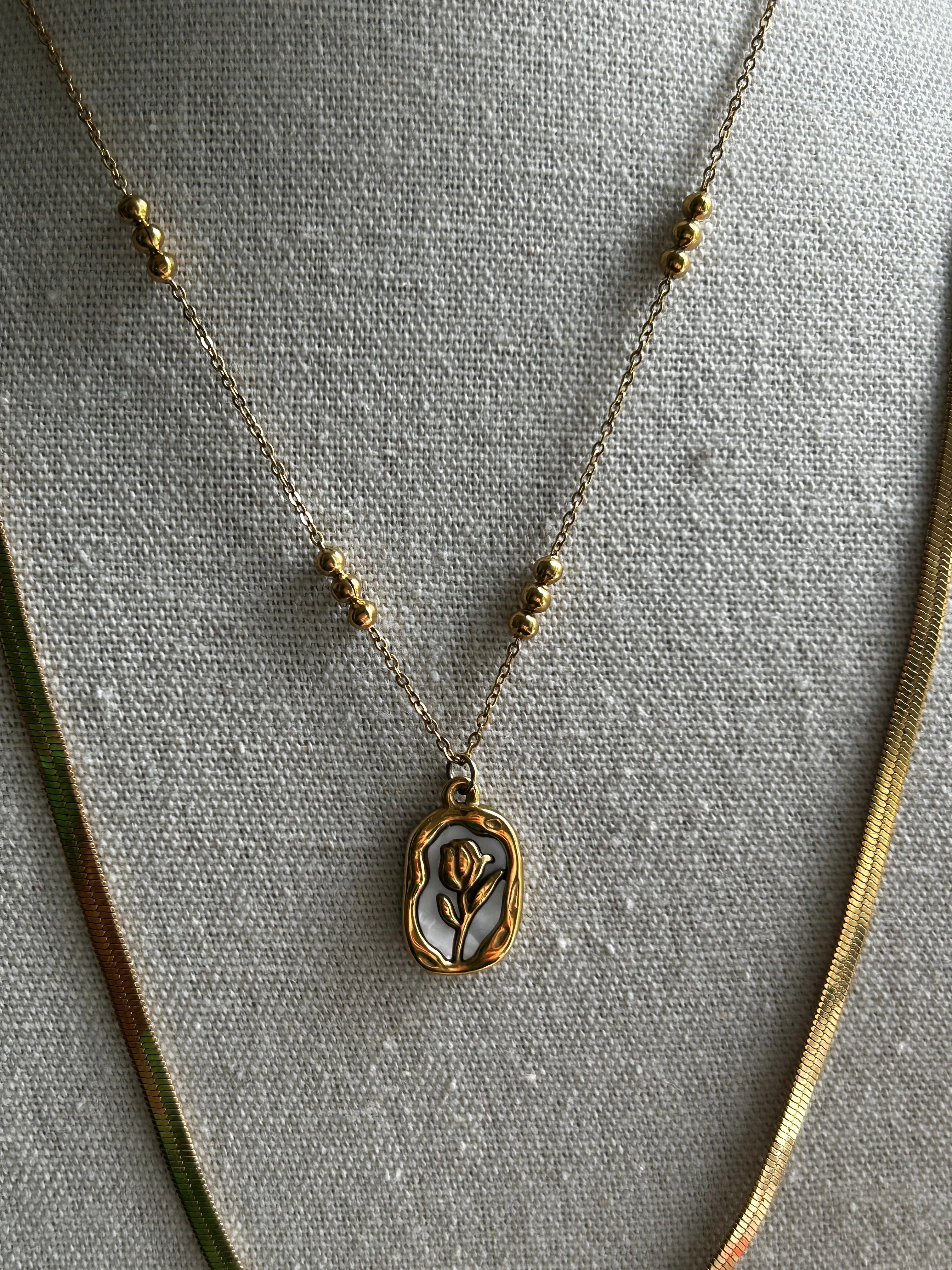 Collier acier inoxydable doré fleur