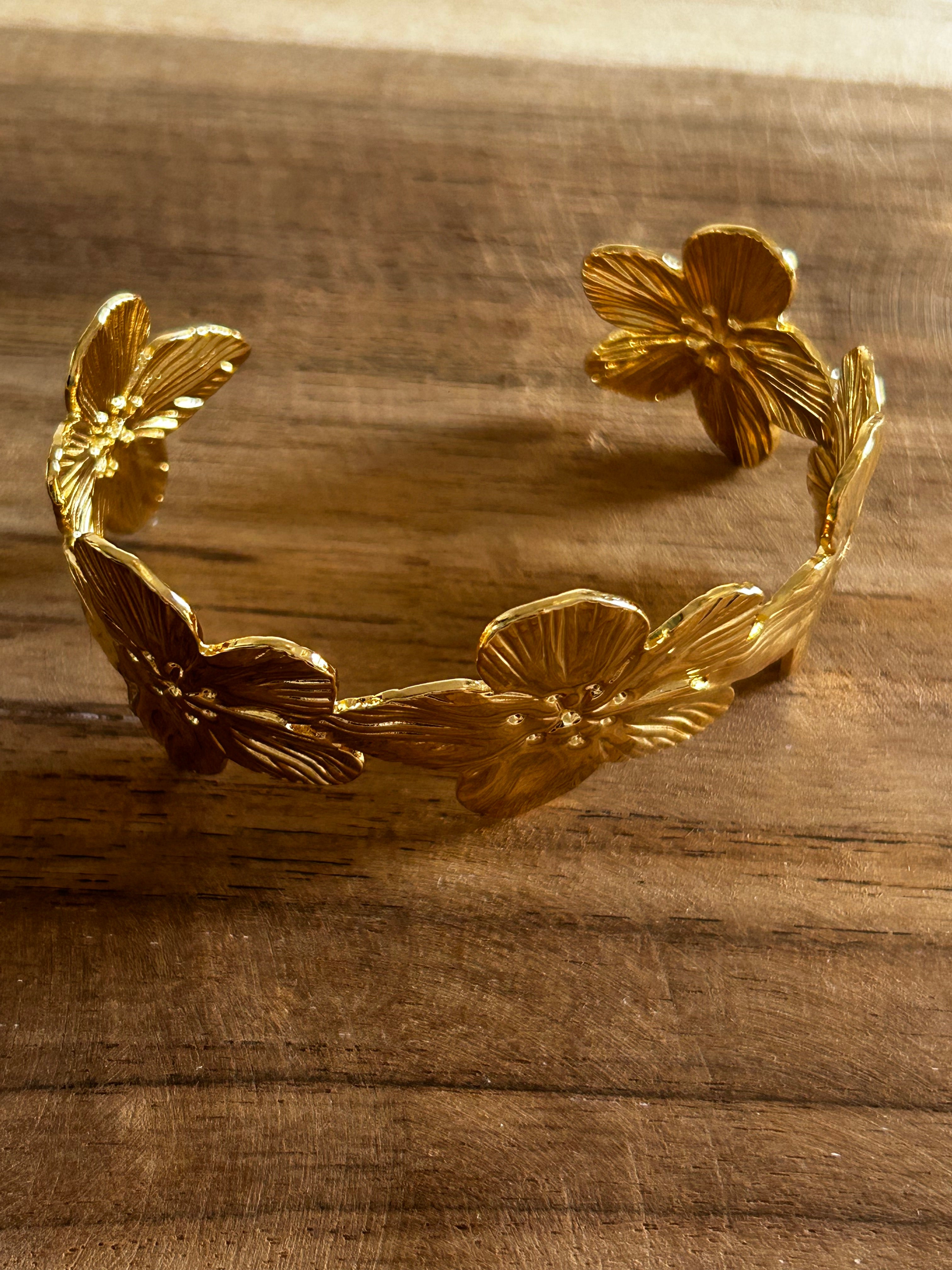 Bracelet réglable acier inoxydable doré fleurs