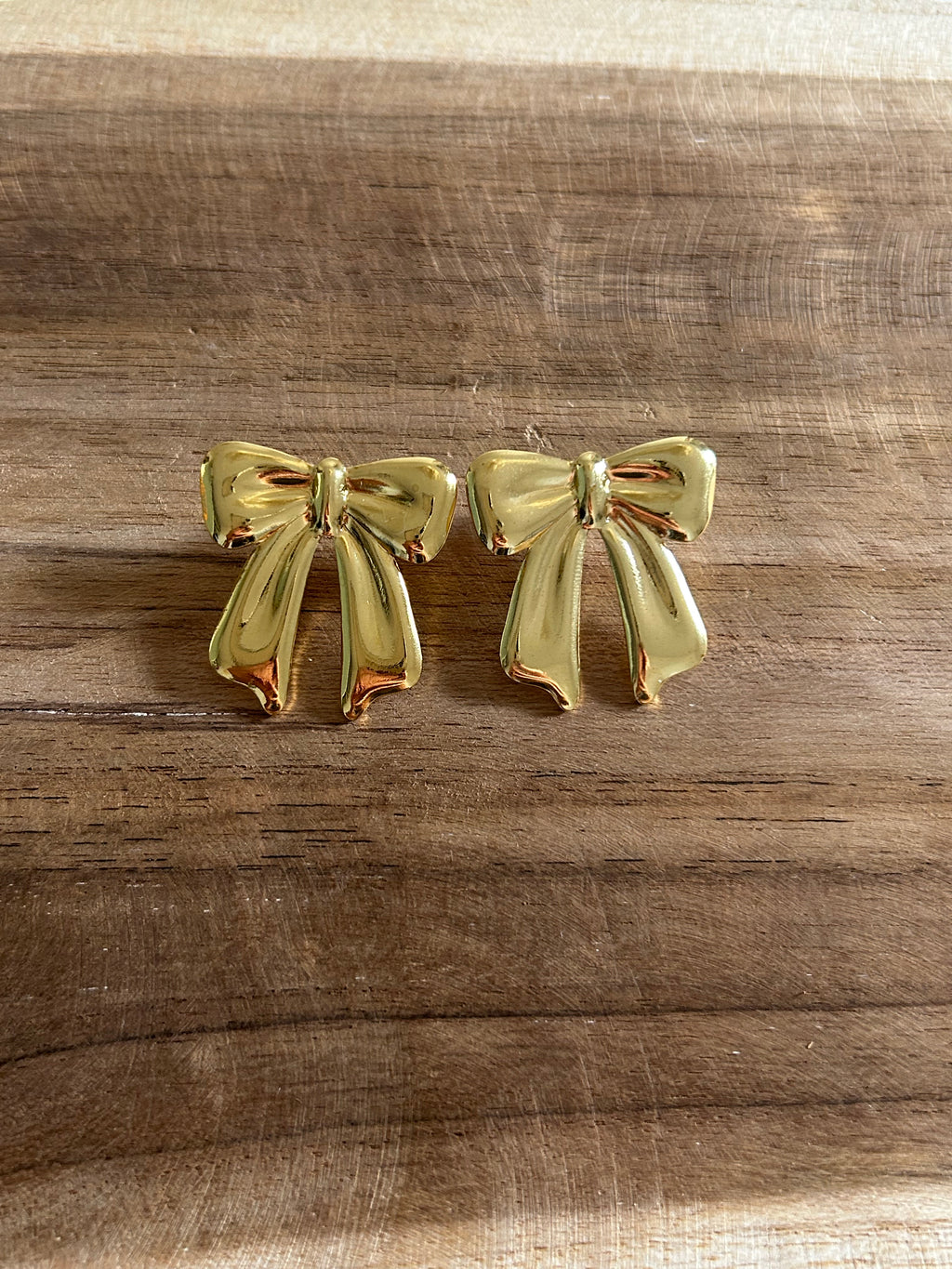 Boucle d’oreille acier inoxydable doré noeud