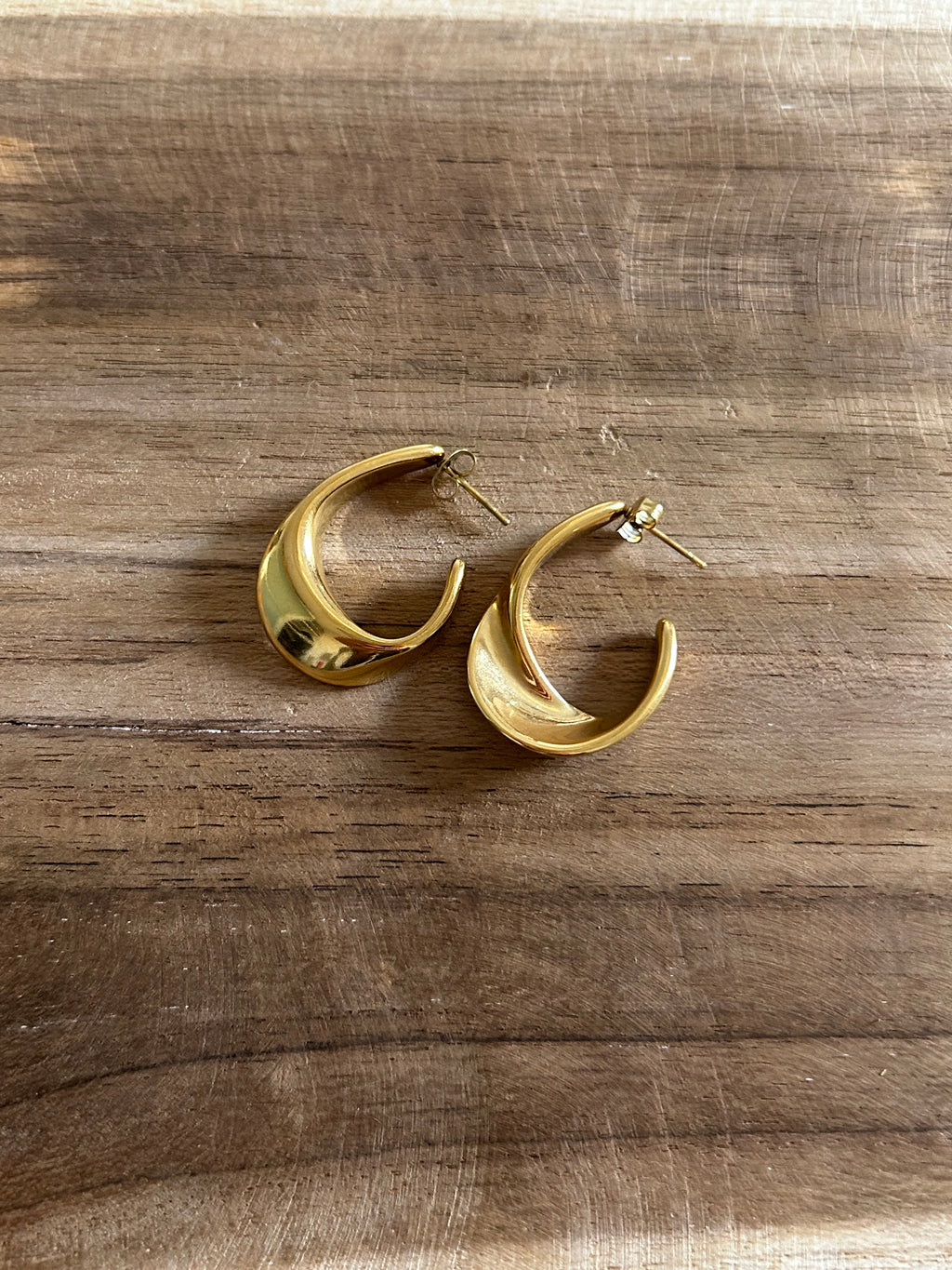 Boucle d’oreille acier inoxydable doré créole ovale torsadée