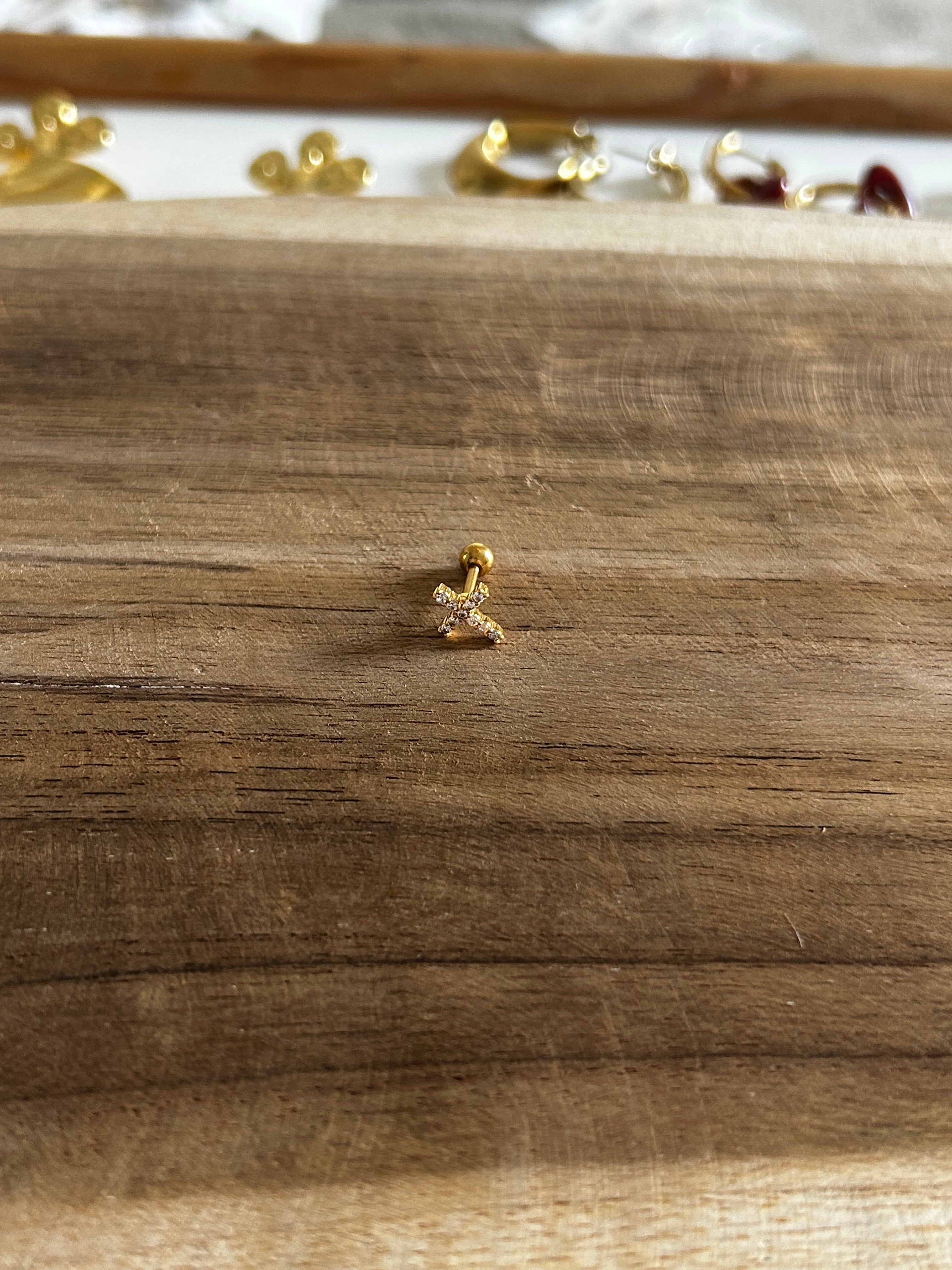 Boucle d’oreille acier inoxydable doré piercing croix à strass